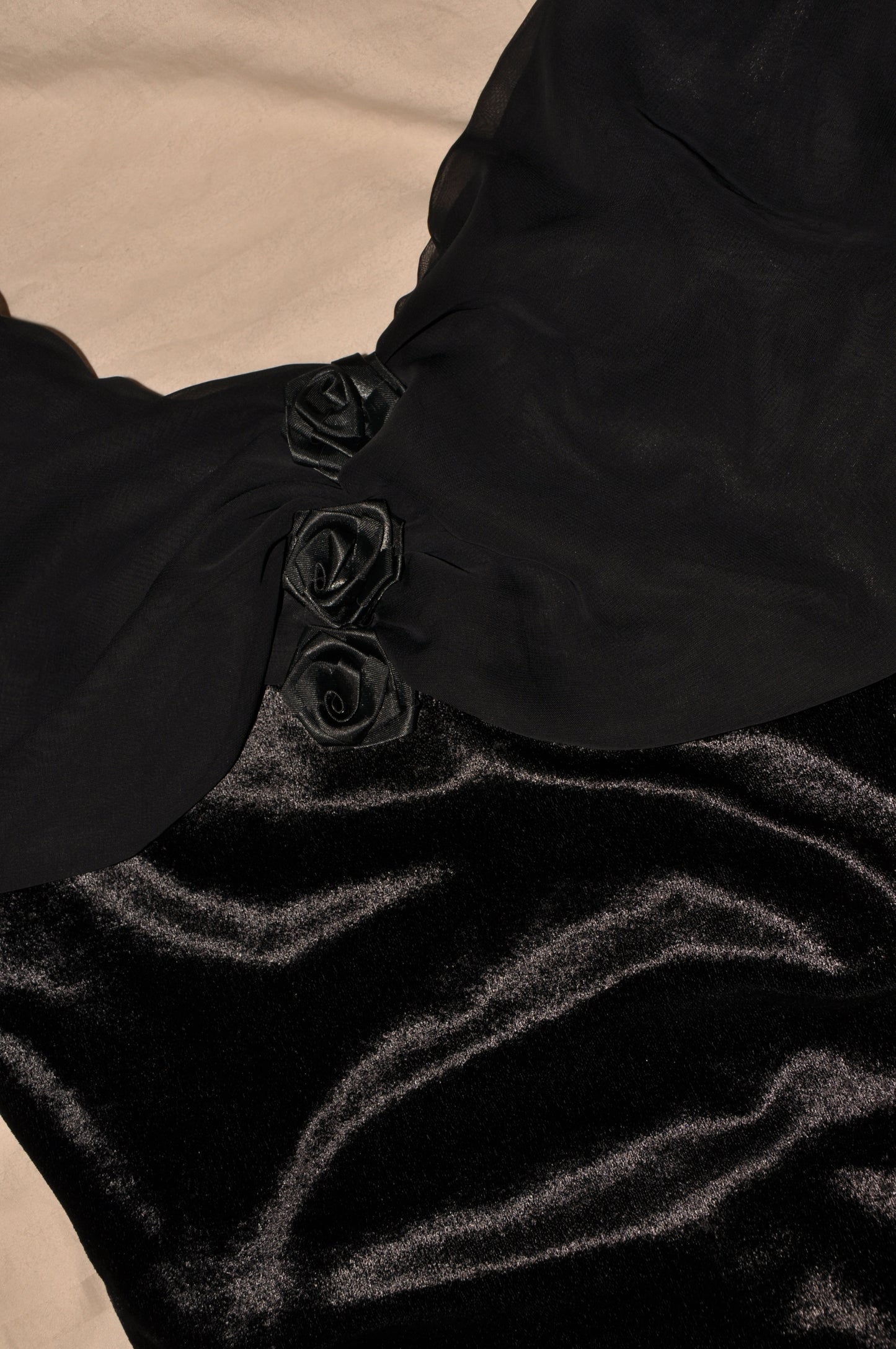 Rose Black Dress Draping Over the Shoulders